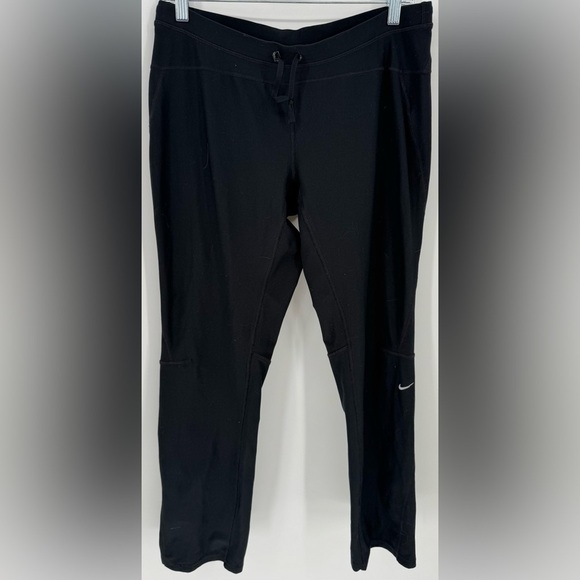 Nike Women's Dri-FIT Unlimited Zippered Cuff Versatile Pants - Picture 4 of 16